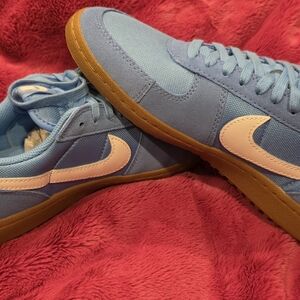 Nike Light Blue Sneakers with White Swoosh and Gum Sole